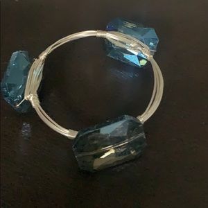 Silver bracelet with blue stones